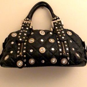 Boutique style faux leather With buckles and also zipper buckles in the front